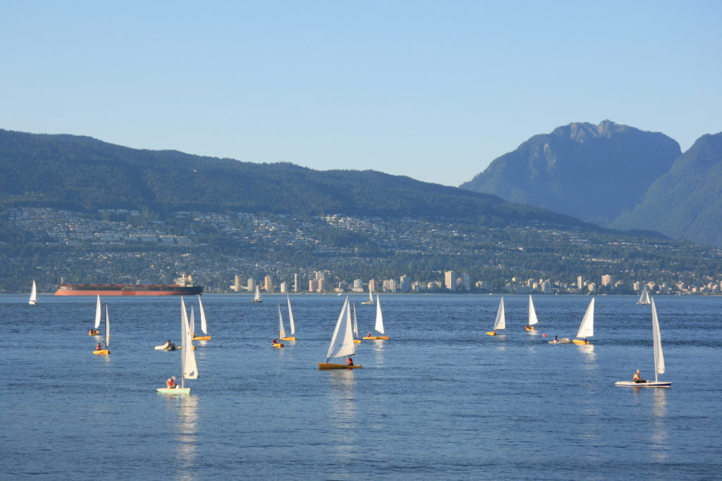 Sailboats in Burrard Inlet as seen from Locarno Beach in Vancouver