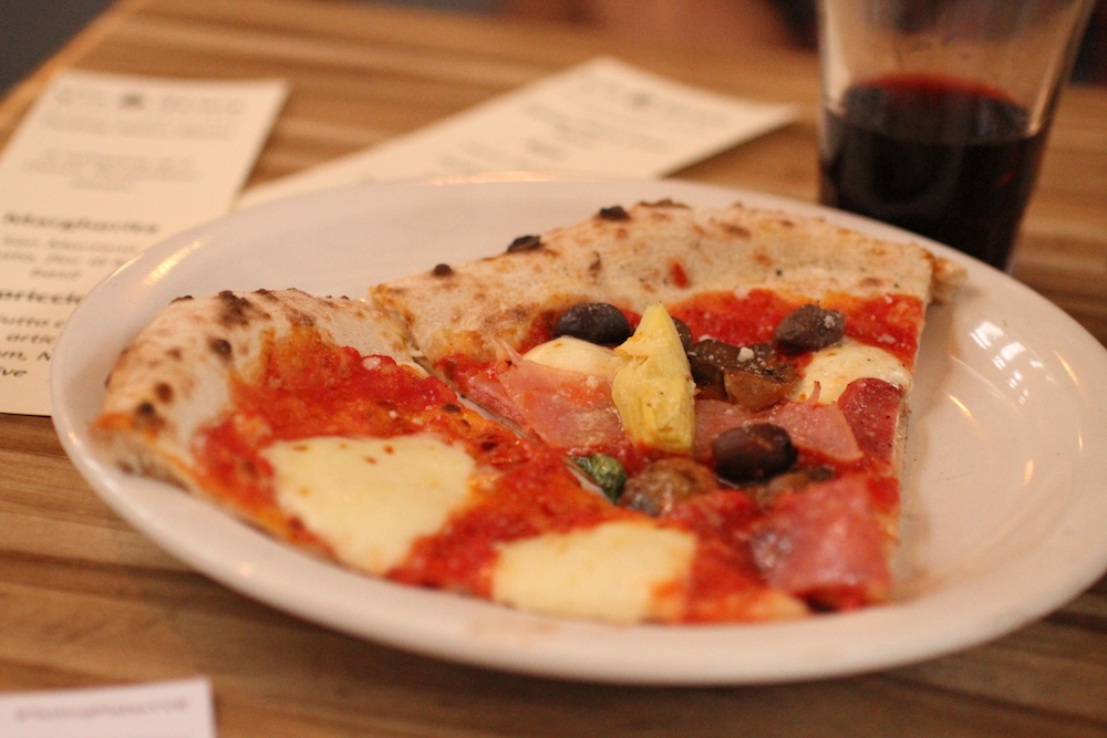 Two slices of pizza from Via Tevere at Tasting Plates Vancouver