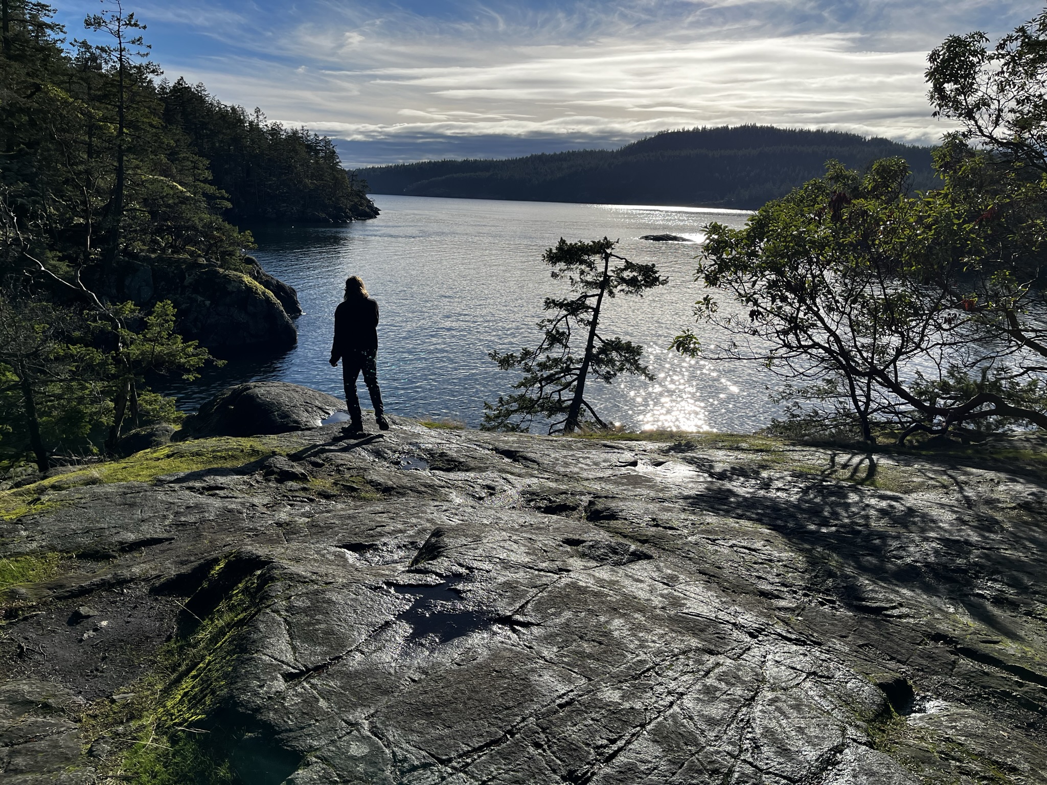 Sam at Smuggler Cove overlooking distant Thormanby Island